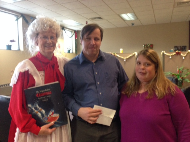 Mrs. Santa talking with owners of ReleaseWire'