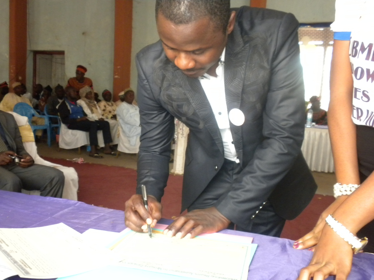 The CEO Signs the Widowhood Rites to Rights Agreement