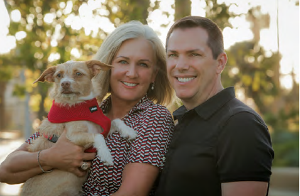 Karin Anderson and John Nave and rescue dog Goldie.'