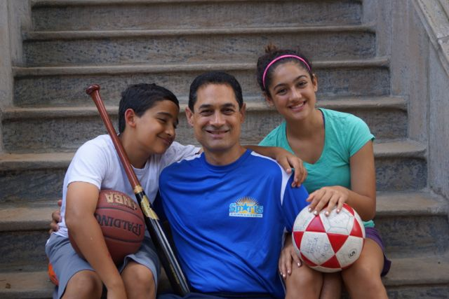 New York Sports Connection founder Aaron Finkel (center)