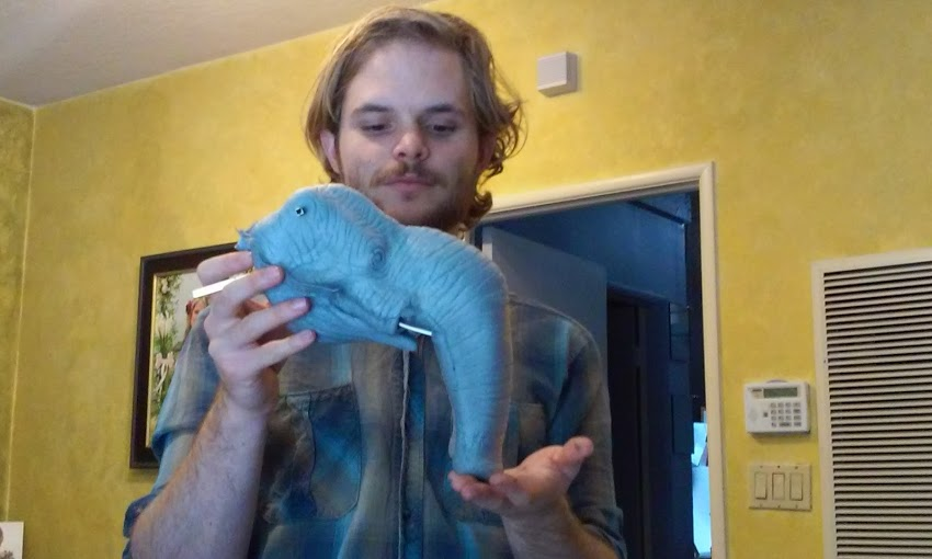 Scott Shelden Holding Einstein's Head