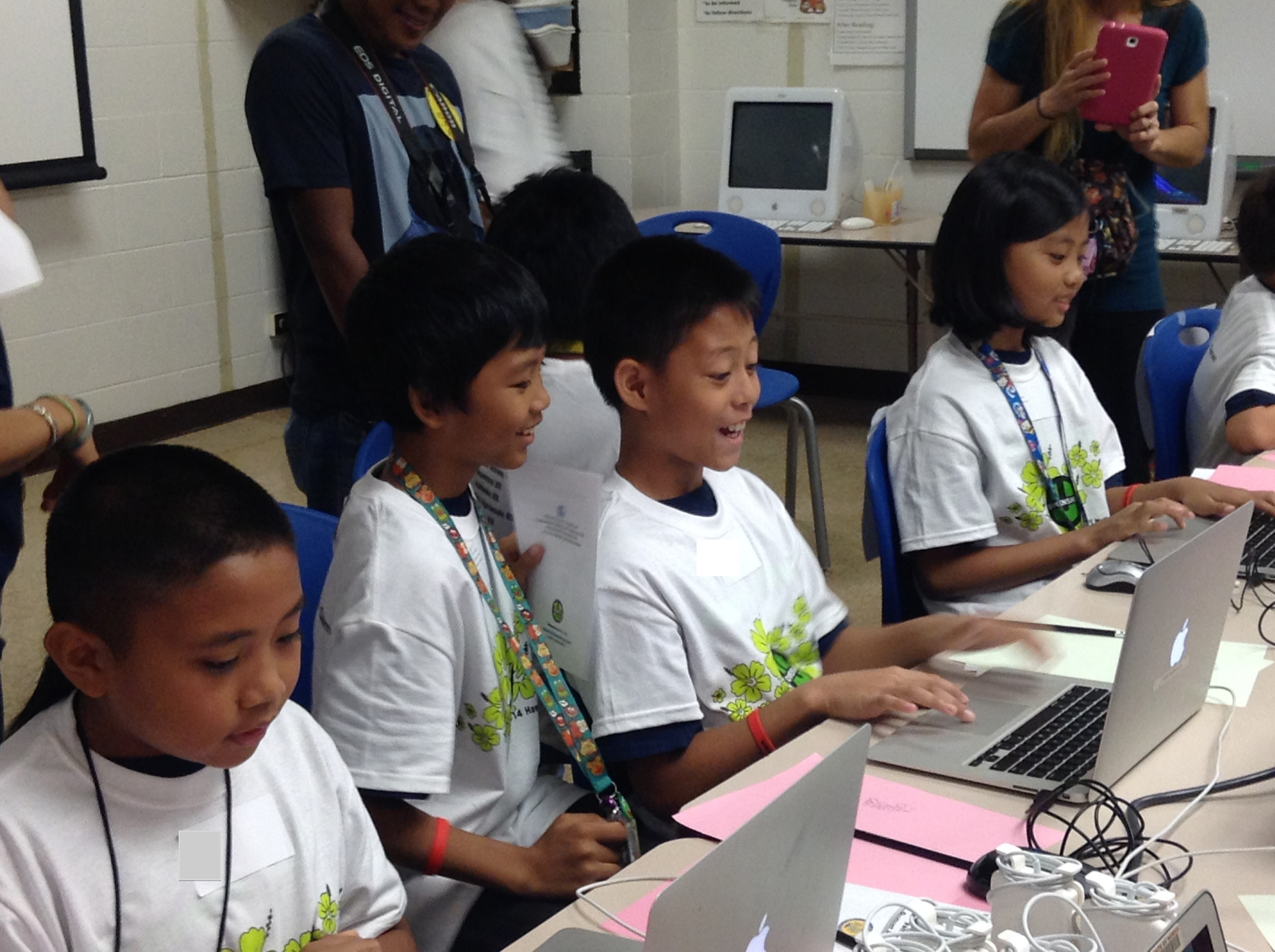 Happy students playing and competing in 2014