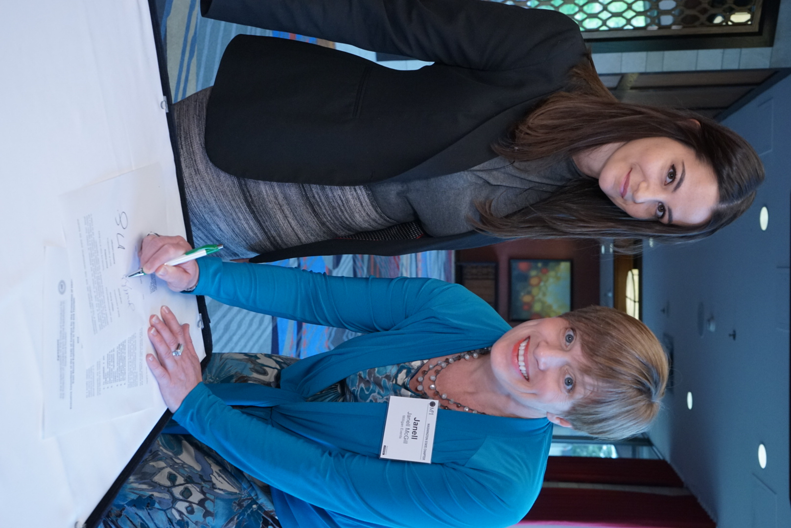 Milligan Signs The Code'