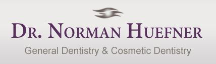 Dr. Norman Huefner Logo