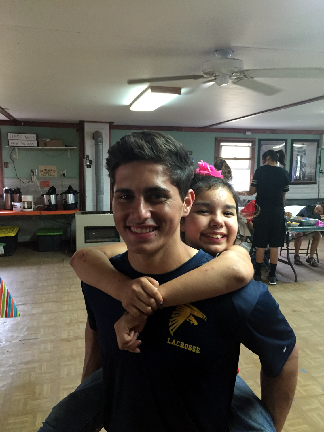 Christopher Montoya-Redlich helping at Lakota children&r