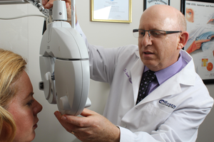 Dr Rosen in an eye exam