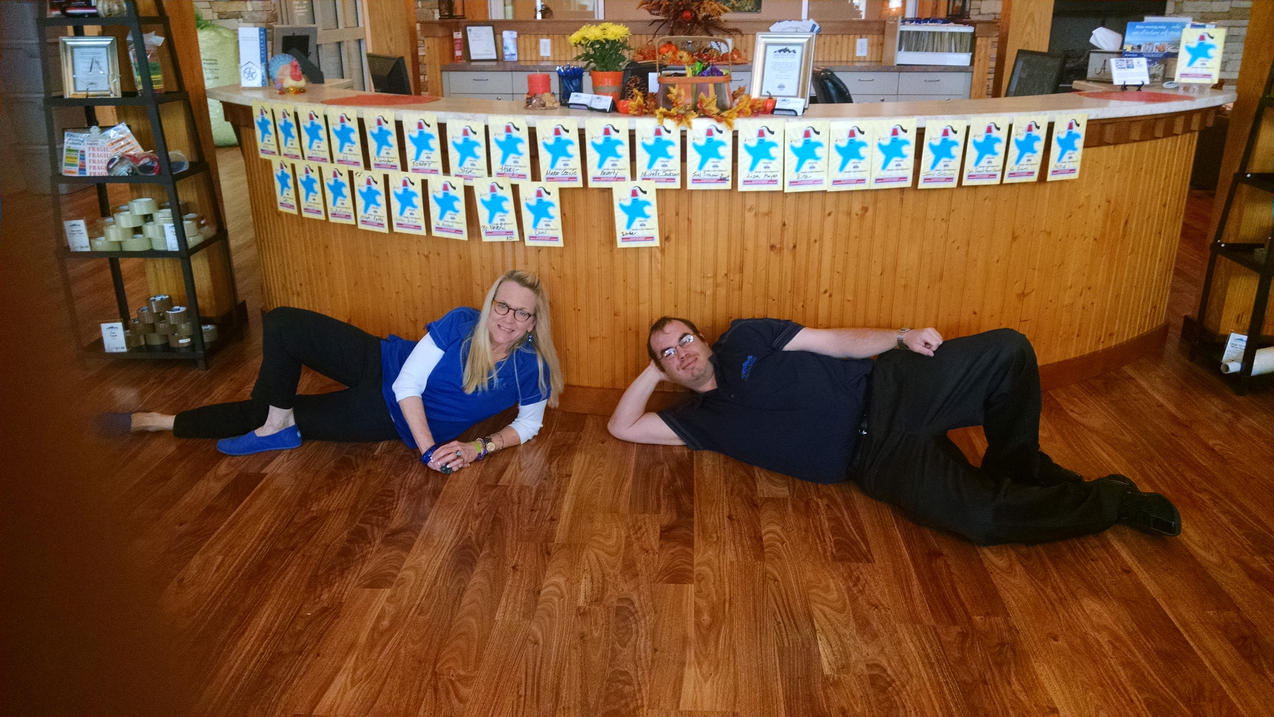 Amazing Spaces Employees Showing Off the Donations